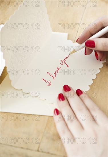 Writing a love letter.