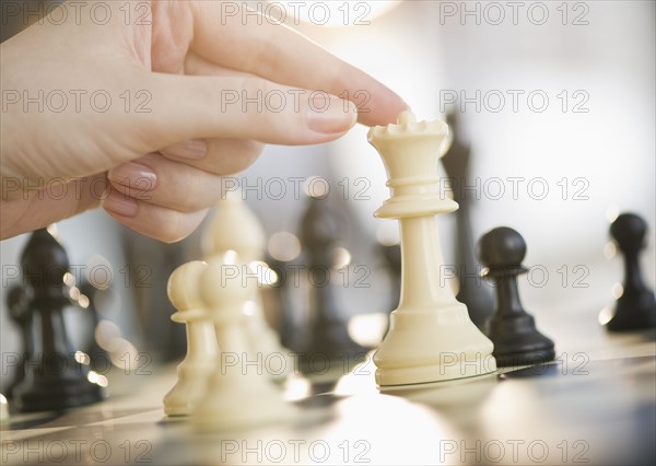 Playing game of chess.