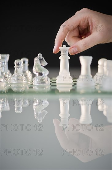 Playing game of chess.