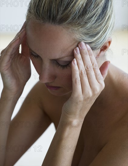 Woman with headache.