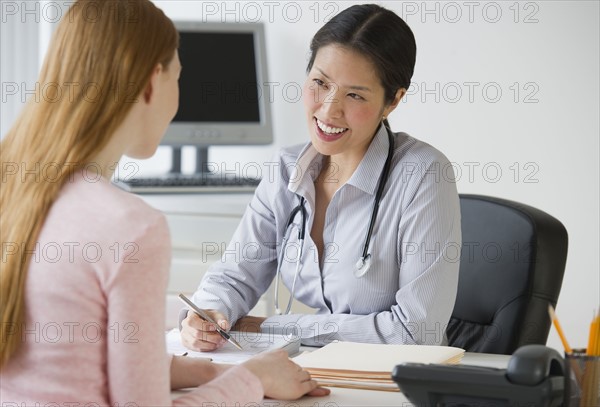 Doctor and patient consultation.