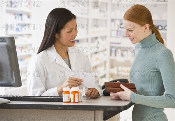 Pharmacist and customer.