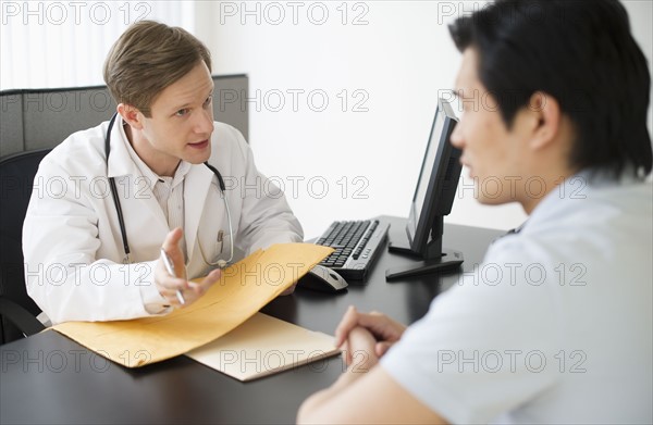 Doctor talking to patient.