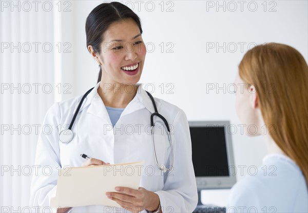 Doctor talking to patient.