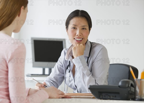 Doctor and patient consultation.