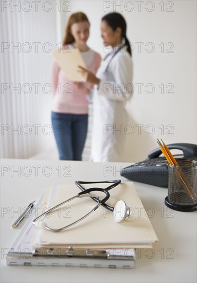 Doctor and patient consultation.