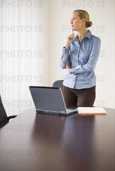 Businesswoman in conference room.