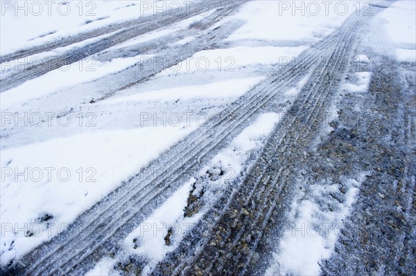 Tire tracks in snow.