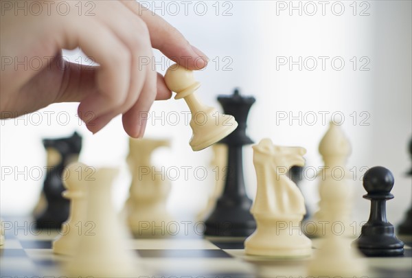 Playing game of chess.