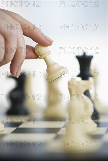 Playing game of chess.