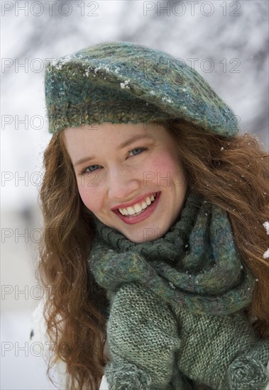 Portrait of a woman on a snowy day.