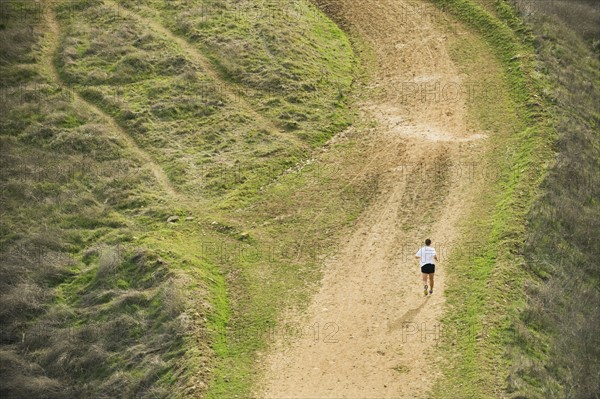 Person running on trail.