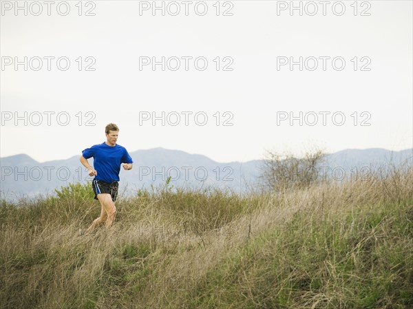 Person running on trail.