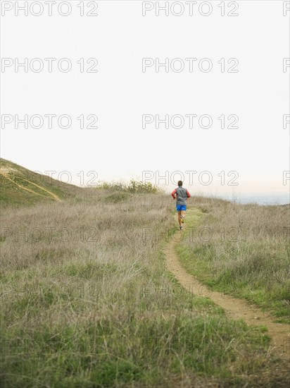 Person running on trail.