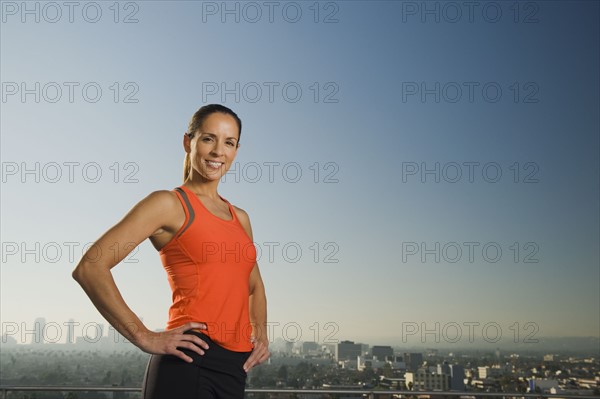 Woman wearing exercise clothing.