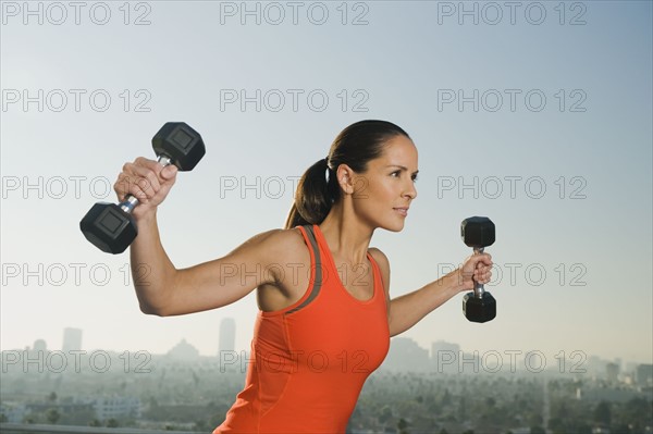 Woman doing weight training.