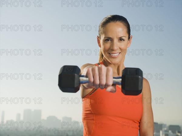 Woman doing weight training.