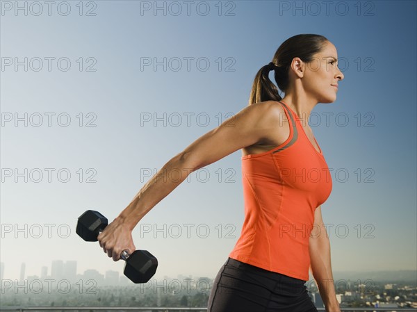 Woman doing weight training.