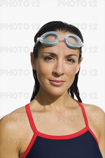 Woman wearing swimming goggles.