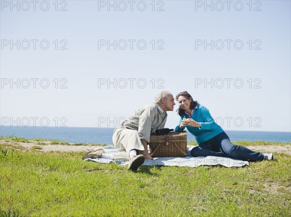 Couple having picnic.