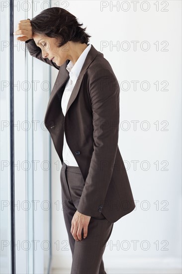 Stressed businesswoman. Photographe : momentimages