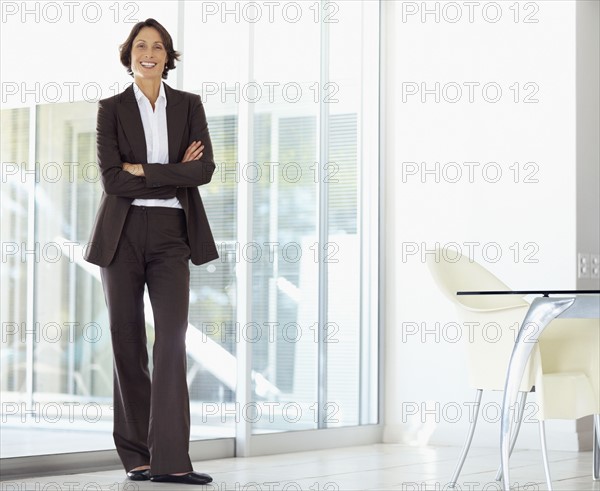 Confident businesswoman. Photographe : momentimages