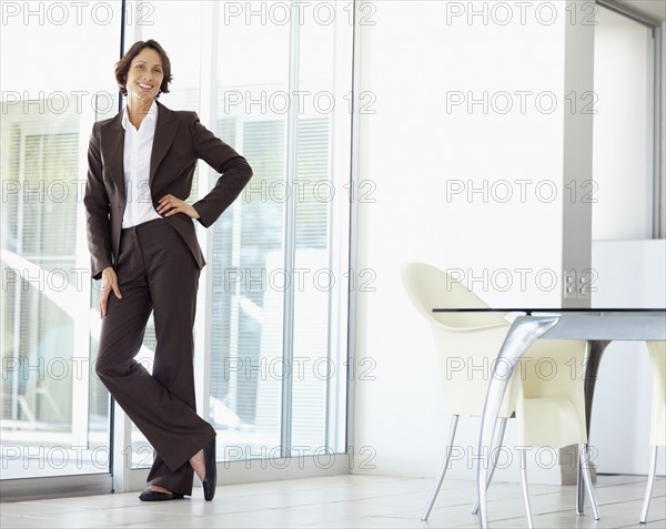 Confident businesswoman. Photographe : momentimages