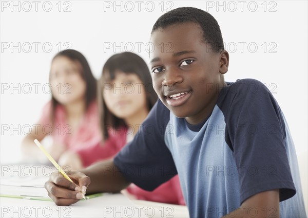 Students in classroom. Photographe : momentimages