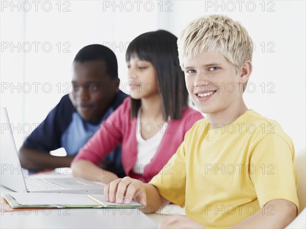 Students in classroom. Photographe : momentimages