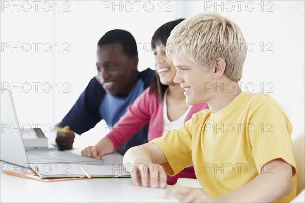 Students in classroom. Photographe : momentimages