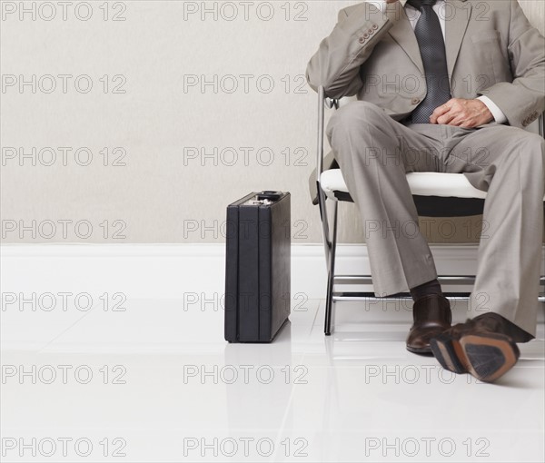 Businessman waiting. Photographe : momentimages