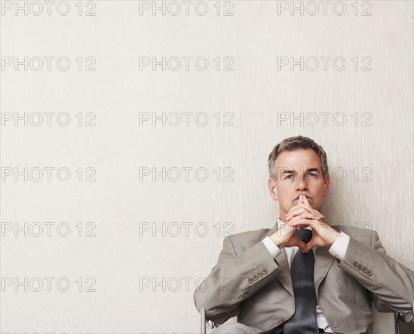 Businessman waiting. Photographe : momentimages