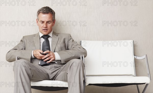 Businessman waiting. Photographe : momentimages