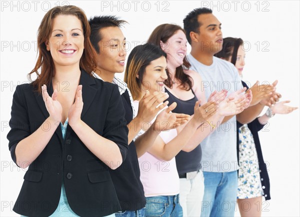 People clapping. Photographe : momentimages