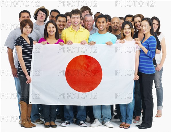 People holding flag. Photographe : momentimages