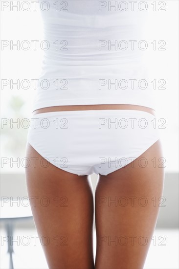 Woman's buttocks. Photographe : momentimages