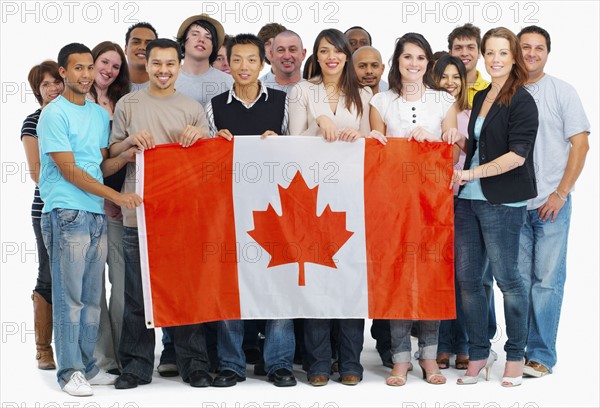 Group of people holding Canadian flag