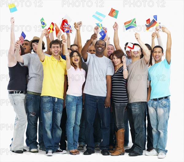 Group of people holding flags. Photographe : momentimages