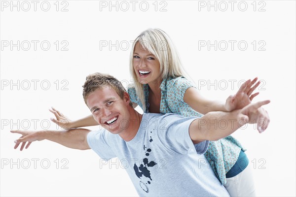 Playful couple. Photographe : momentimages