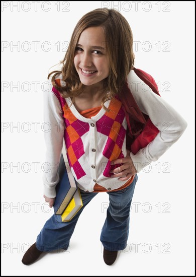 Student carrying books. Photographe : Mike Kemp