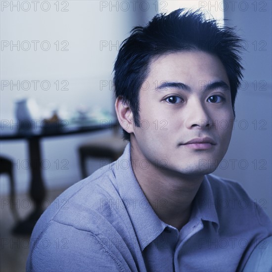 Portrait of a young man. Photographe : Rob Lewine