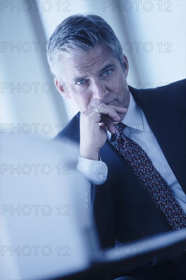 Serious businessman. Photographe : Rob Lewine