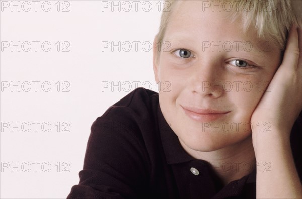 Portrait of a young boy. Photographe : Rob Lewine