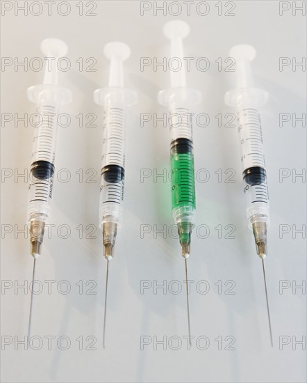 Four syringes. Photo : Jamie Grill