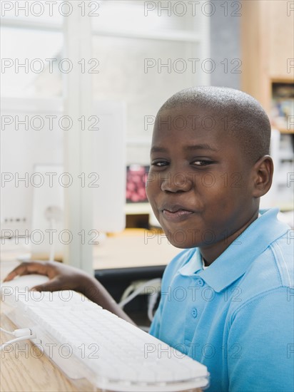 Student sitting at computer.