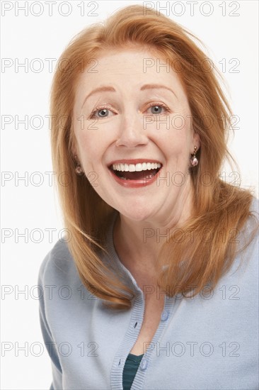 Happy red haired woman. Photo : K.Hatt