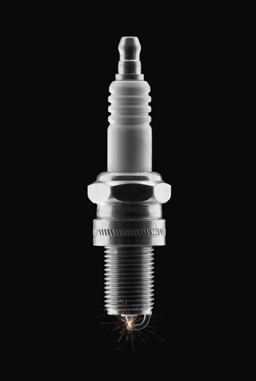 Lit spark plug. Photo : Mike Kemp