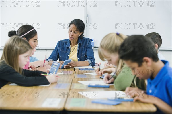 Students doing math work in classroom.