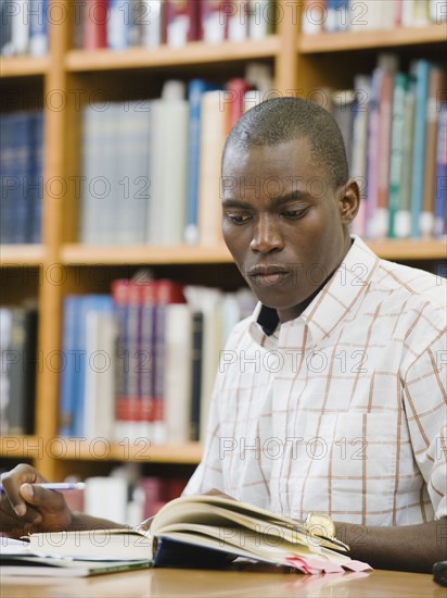 College student working in library.