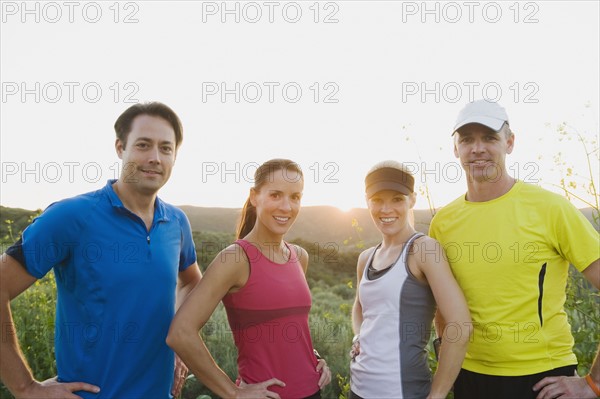 Athletes posing for the camera.